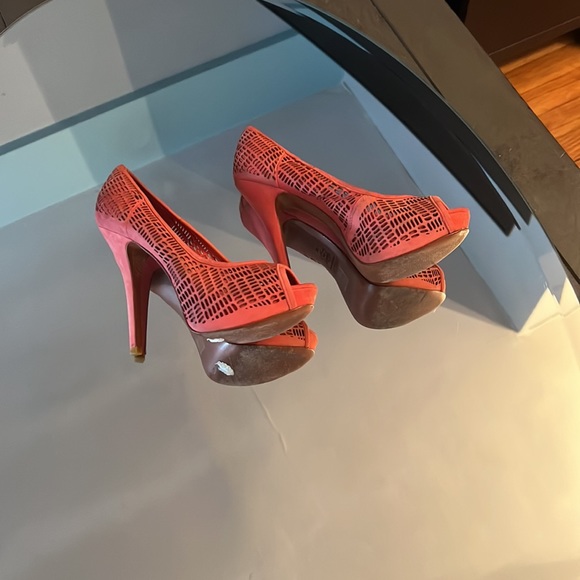 Hey ya, please check out orange heels from Aldo for $30. super comfortable. - Picture 3 of 3